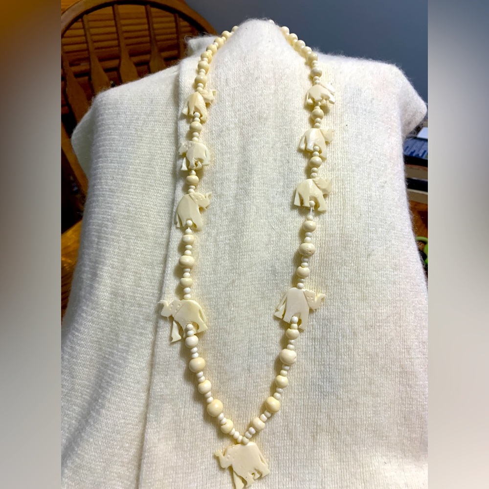 Vintage carved bone elephants